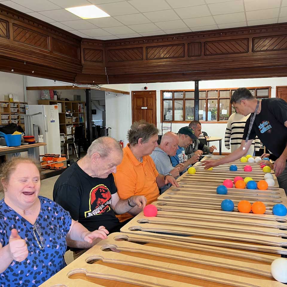 Using the juggle boards. Additional learning needs circus workshop.