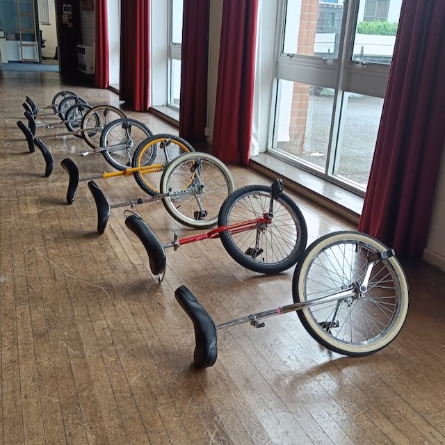 unicycle class. Unicycles at the ready